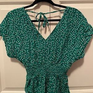 NWOT Gorgeous green dress with small white flower prints. V-neck front and back